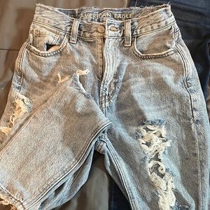 mom jeans, lots of nice rips, bought them from American eagle.